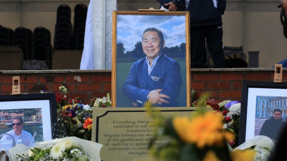 A framed photograph of Vichai Srivaddhanaprabha is prominently displayed Sunday within the recently opened memorial garden honoring the five people killed in a helicopter crash at the King Power Stadium in Leicester, England. Photo: Lindsey Parnaby / AFP