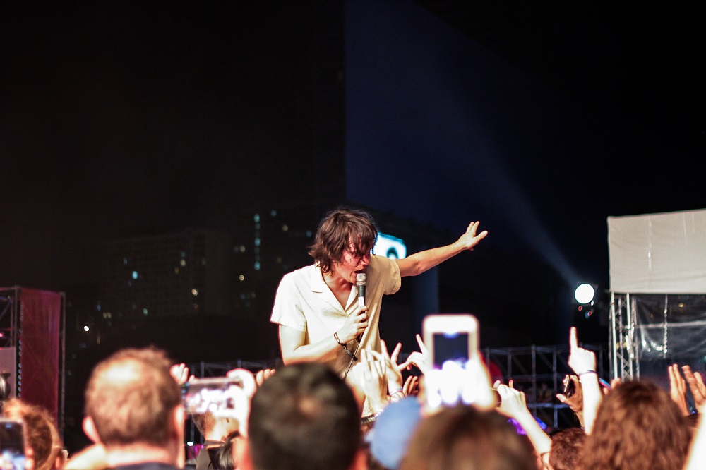 Ambrose Kenny-Smith of King Gizzard & The Lizard Wizard joins the crowd during the song “The Bitter Boogie” 