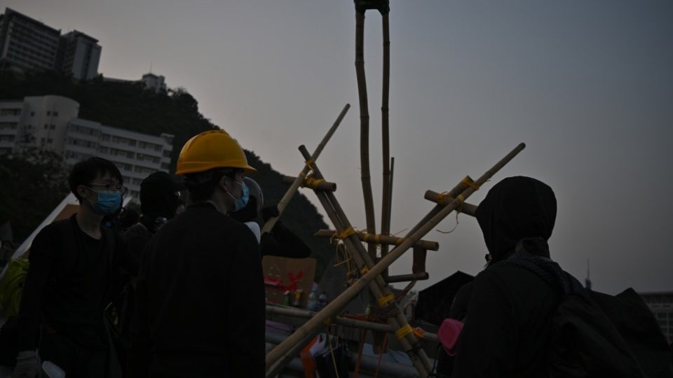 Protesters gather with a catapult made from bamboo at the Chinese University of Hong Kong on Nov. 13, 2019. Photo via AFP.