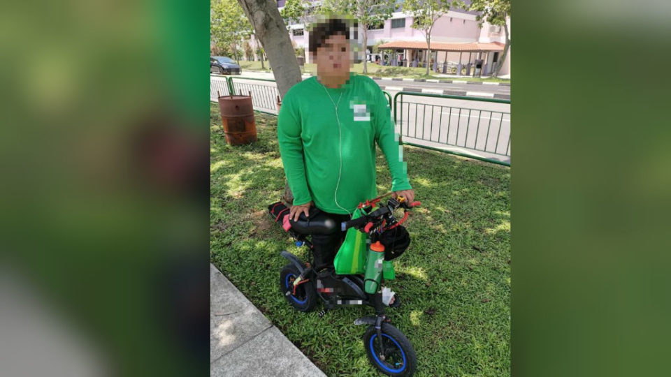 A man caught riding an unregistered “e-scooter.” Photo: Land Transport Authority/Facebook