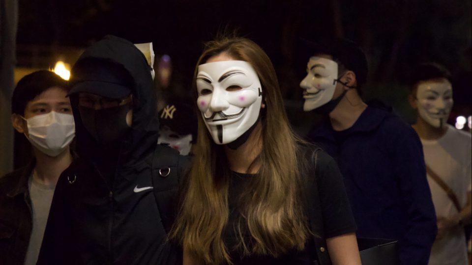 A protester wears a Guy Fawkes mask during a demonstration on Hong Kong Island on Oct. 31, 2019. Photo by Vicky Wong.