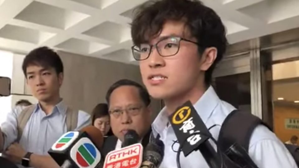 Chinese University of Hong Kong student union president Jacky So addresses reporters shortly after applying for an interim injunction to ban police from entering campus without a warrant following a night of intense clashes on campus.