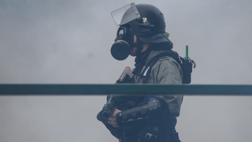 Tear gas is fired by police as protesters attempt to escape the campus of the Hong Kong Polytechnic University on Nov. 18, 2019. Photo via AFP.