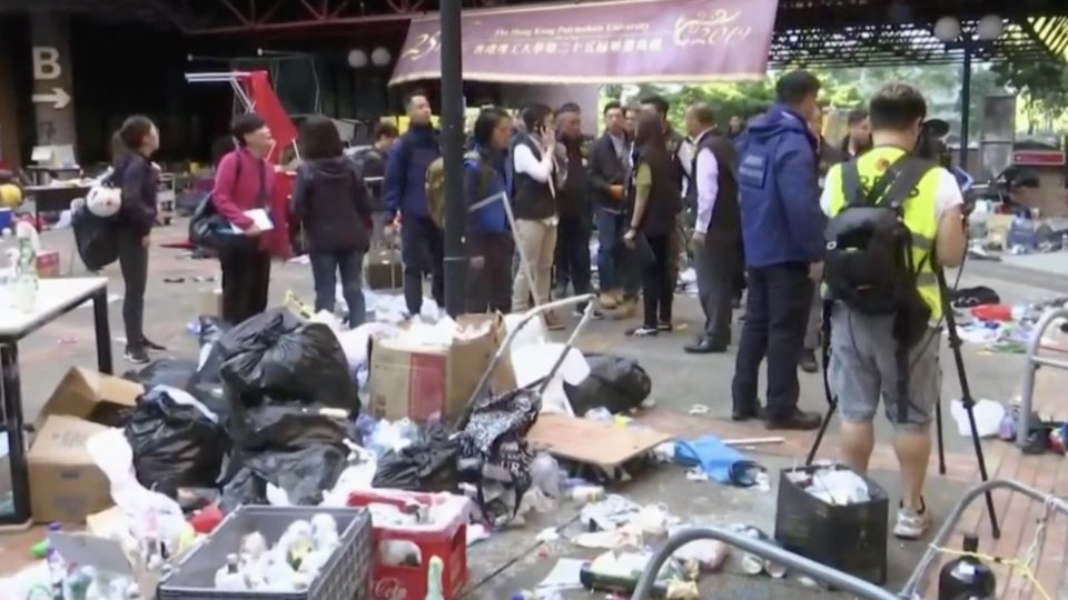 Police entering the Hong Kong Polytechnic University campus on November 28, 2019 to begin their search of the campus for evidence and protesters. Screengrab via Facebook video/RTHK.