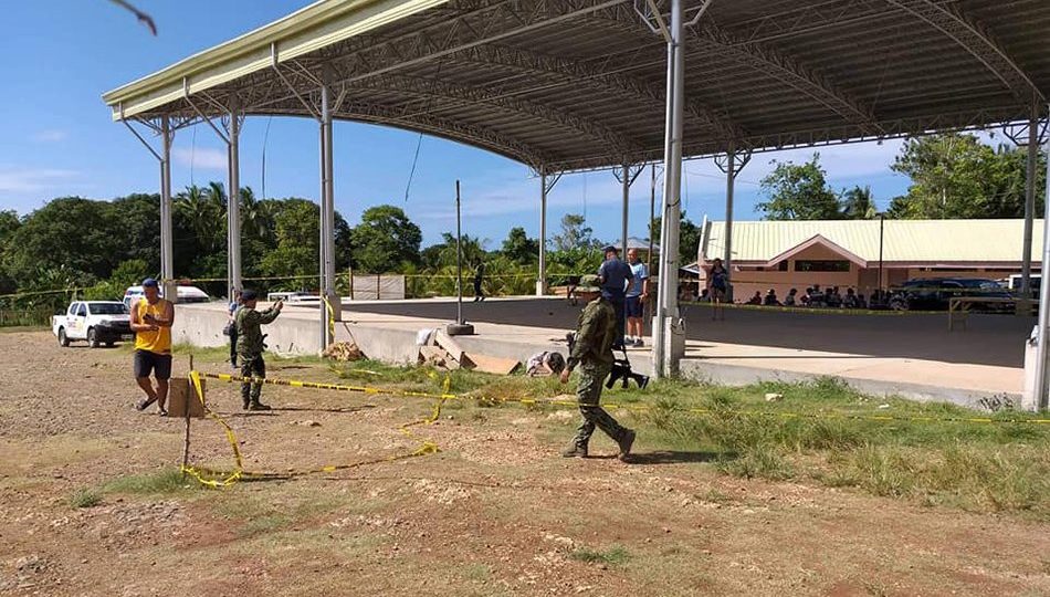 Police inspecting the blast inside Initao College <I>Photo: ABS-CBN News</I>