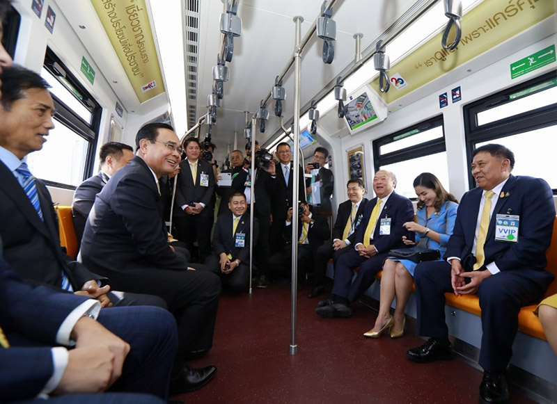 Prime Minister and former junta leader Prayuth Chan-o-cha, second from left, sits across from Bangkok Gov. Aswin Kwanmuang along with BTS Group officials and other VIPs on Wednesday at the opening of the new four-station extension to the BTS Sukhumvit Line. Photo: BTS Group