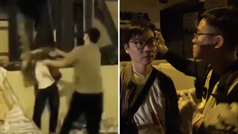 The moment a man clearing Nathan Road was struck on the head by what appears to be a manhole cover. Screengrab via Facebook video.