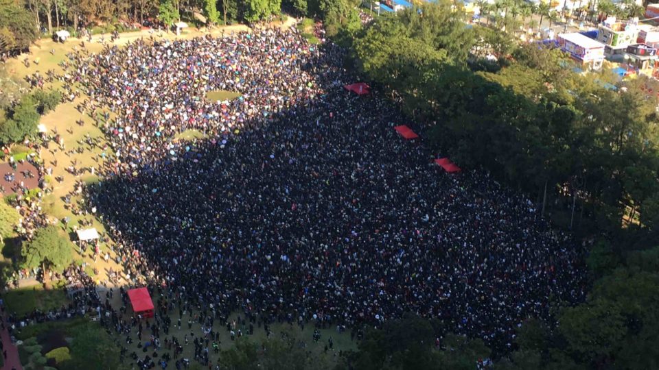 The crowd at Victoria Park just before 3pm, when the march was slated to begin. Photo by Stuart White.