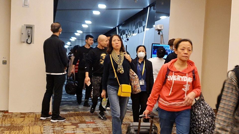 Travelers arriving from Wuhan, China, are scanned for elevated body temperatures at Changi Airport. Photo: Khaw Boon Wan/Facebook