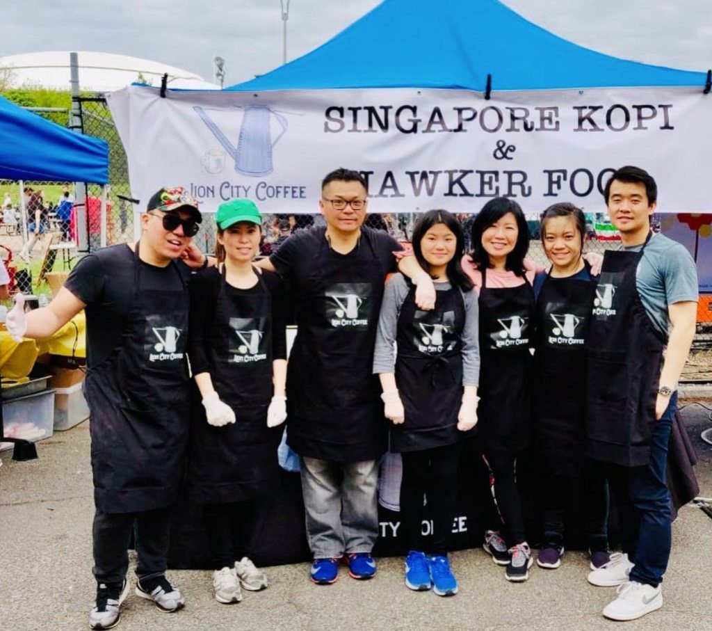 Chuin (right) and Yeen (second to left) and family working the Lion City Coffee stall at the Queens Night Market. Photo: Lion City Coffee