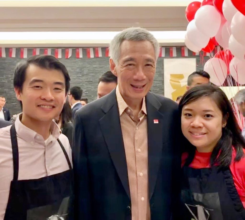 Lion City Coffee’s Chuin (left) and his wife Faye (right) with Singapore Prime Minister Lee Hsien Loong at the Singapore Consulate in NYC for their National Day reception where they were serving kopi and kaya toast. Photo: Lion City Coffee