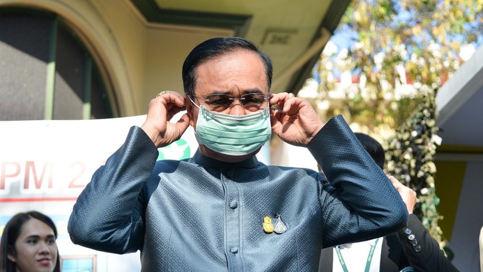 Prime Minister Prayuth Chan-o-cha wears a face mask