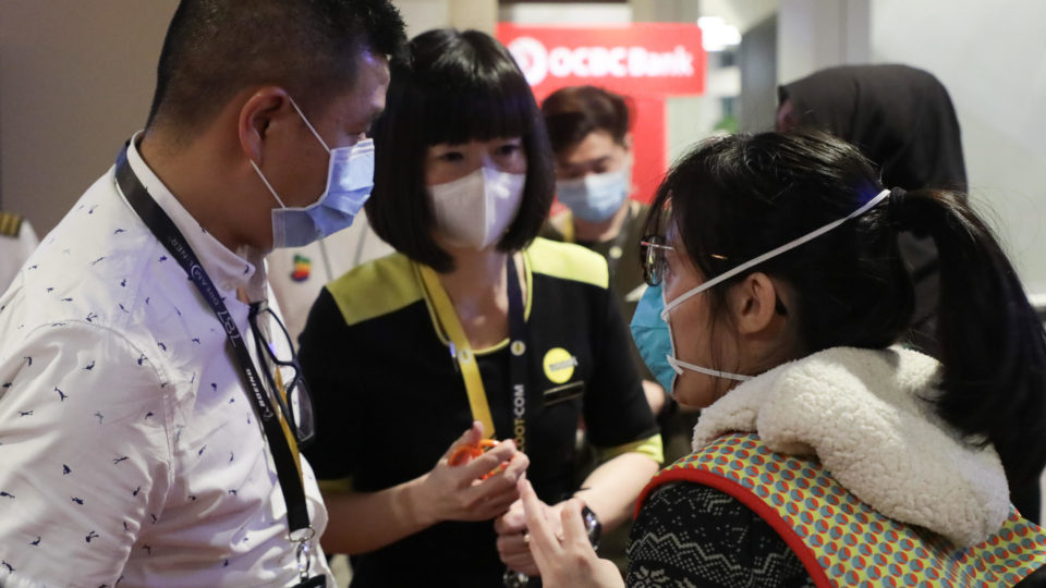 Pre-flight preparations by MFA, MOT, CAAS, airport and airline officers at Changi Airport for flight to Wuhan. Photo: Singapore Foreign Affairs Ministry