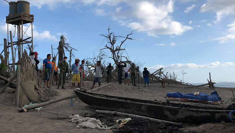 Missing Batangas resident’s body found near an ash-buried boat on Saturday <i>Photo: Jonathan Magistrado / ABS-CBN News</i>