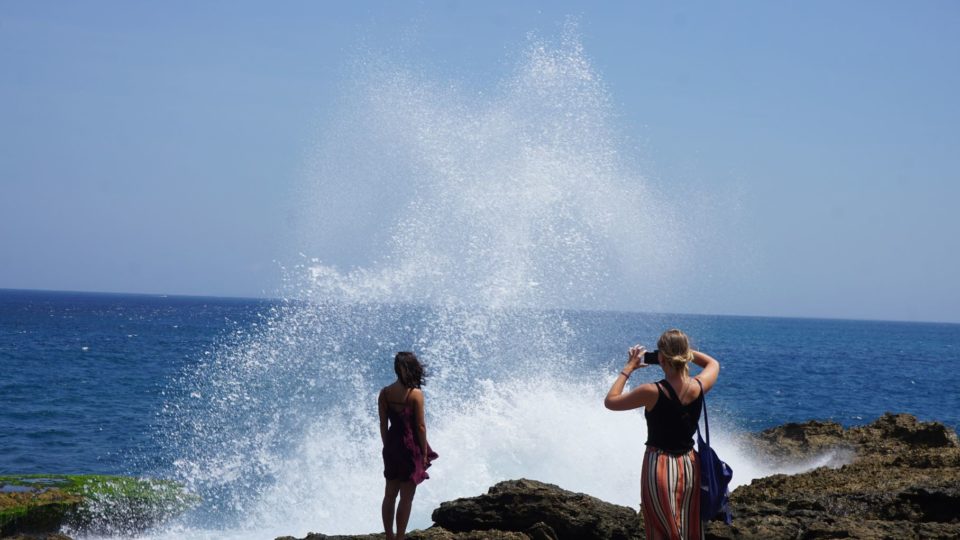 Tourists taking a photo at the Devil’s Tear cove in Nusa Lembongan. Photo: Coconuts Media