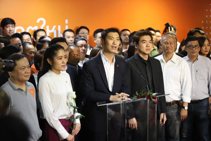 Thanathorn Juangroongruangkit, at center, speaks Jan. 21 at a press conference after his party Future Forward Party was acquitted of ties to an internet conspiracy theory about the so-called Illuminati. Photo: @Thanathorn_FWP / Twitter