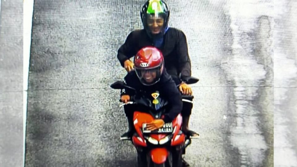 A photo of the traffic violation was caught by an Electronic Traffic Law Enforcement (ETLE) traffic camera, showing a male motorcyclist illegally driving on a TransJakarta bus lane. However, the motorcycle’s license plate was obscured by the driver’s arm, who, along with his passenger in the back, grinned as they pulled off the stunt. Photo: Jakarta Metro Police