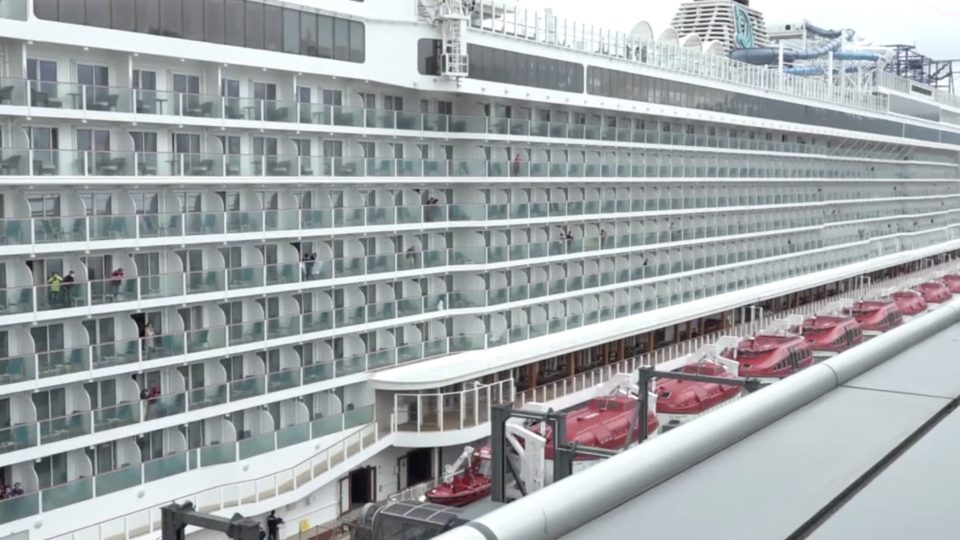 Passengers stranded on board the World Dream cruise liner after at three crew members reported feeling sick. Screengrab via Facebook video/Stand News.