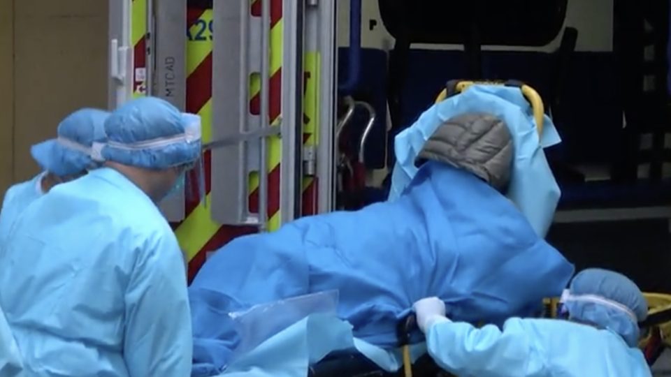 A 72-year-old woman is taken to Princess Margaret Hospital after testing positive for the Wuhan coronavirus. Screengrab via Apple Daily video.