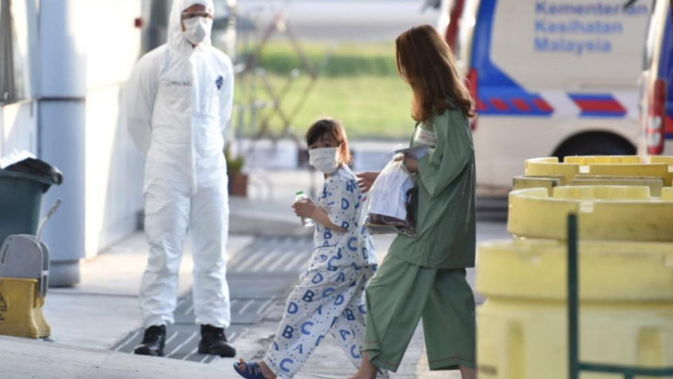 Malaysians go into quarantine Wednesday after being repatriated from Wuhan, China. Photo: @Kkmputrajaya/Twitter