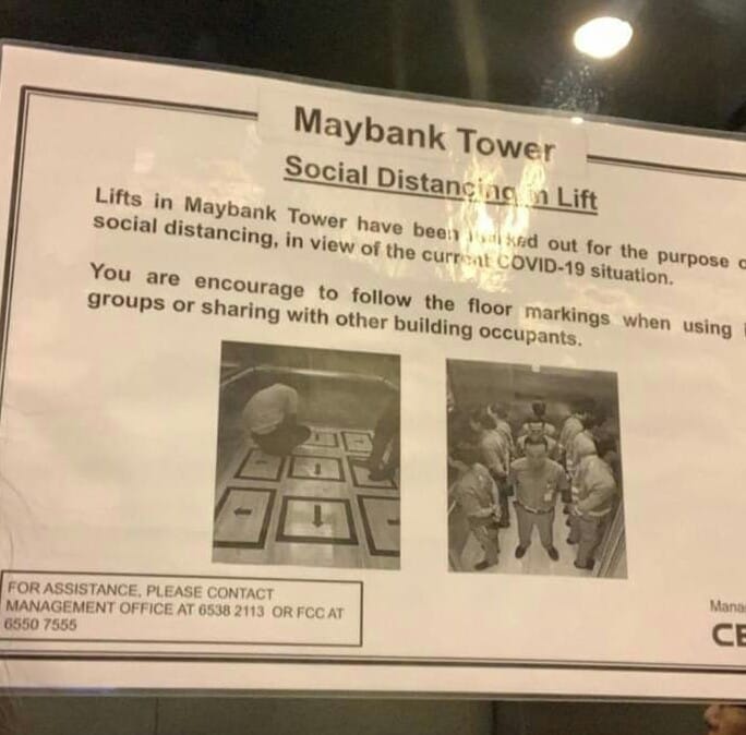 A sign explains social distancing at a lift in the Maybank Tower. Photo: Raven Qiu via Complaint Singapore/Facebook