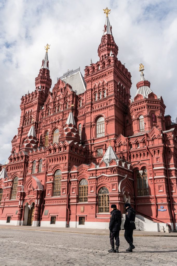 Police officers patrol outside the State Historical Museum.