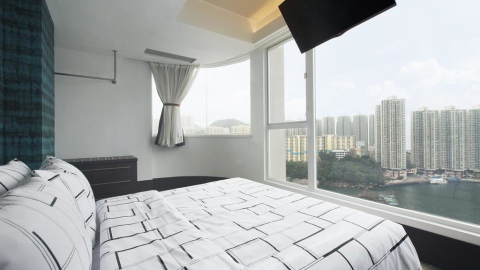 A harbor-facing room at the hotel where the defendant WAS quarantining until he decided to leg it to Shenzhen. Photo: Ovolo Hotels