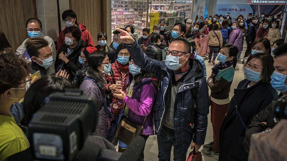 Hongkongers queue for face masks at a Watsons on January 30, 2020. Photo: Studio Incendo via Wikimedia Commons