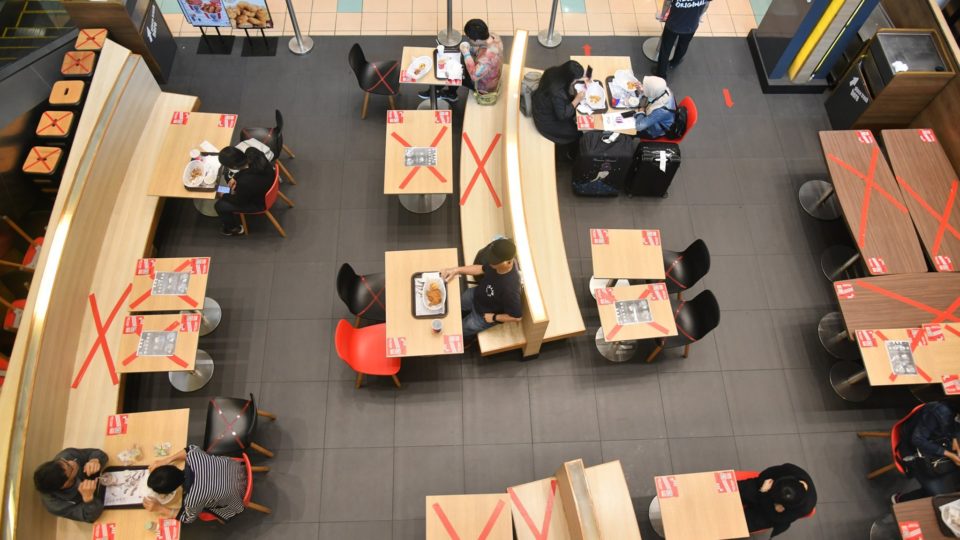 A restaurant complying by government restrictions on spacing and seating capacity. Photo: Hong Kong Government