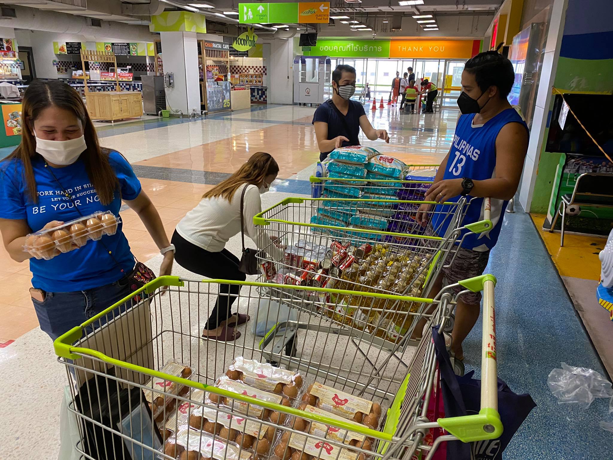 The group buying food for other members of the community. Photo: Jaycee Dilan