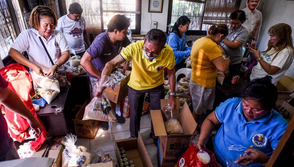 Food supplies being repacked in Bacoor, Cavite. Photo: George Calvelo/ABS-CBN News