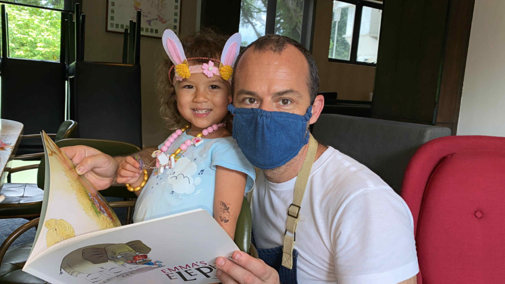 Bemasked Papa-Chef Patrick with his adorable daughter Thea. Photo: June Cheng/Atout
