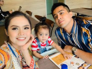 Bella takes a selfie with Aliff and their son Muhamad Ayden Adrean. Photo: Bella Astillah / Instagram