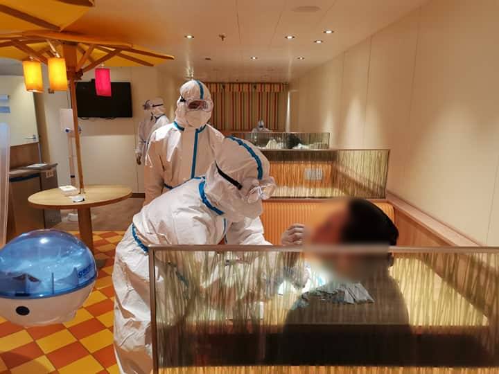 Passengers from another cruise ship docked in Manila Bay receive coronavirus swab tests. <i>Photo: Philippine Coast Guard / FB</i>