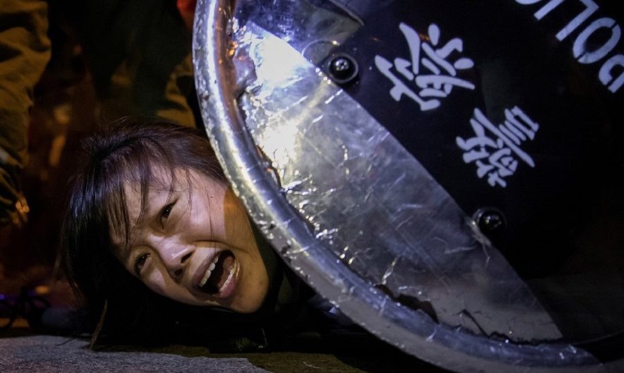 A protester is detained by police during skirmishes outside Mong Kok police station on Sept 2, 2019. Photo: Tyrone Siu/Reuters
