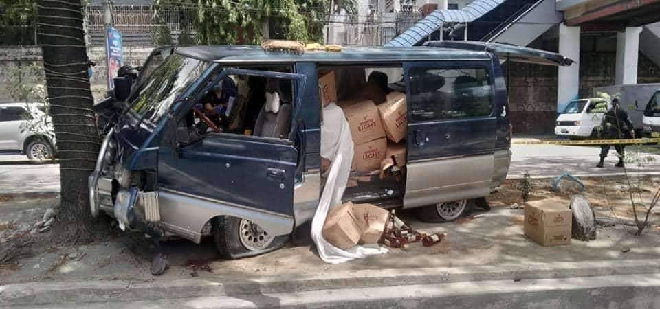 The suspects’ van with boxes of alcohol. Photo: NCRPO Public Information Office