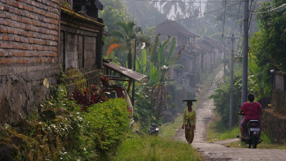 File photo of a woman walking on a street in Bali. Photo: Pixabay 