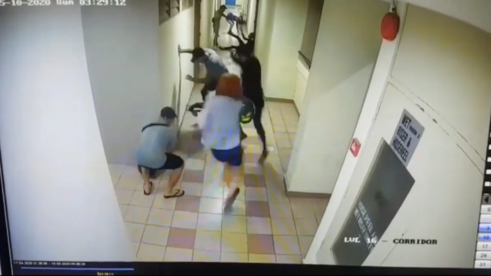 A melee unfolds in an undisclosed Upper Cross Street building in a still image from a security camera. Image: Izwan Idris/Facebook