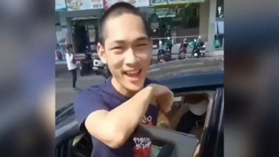 Screenshot of a video showing YouTuber Ferdian Paleka with a smirk saying that he was “more comfortable inside” his cell as he drove away in a car. His lawyer later said that the remark was made in jest.