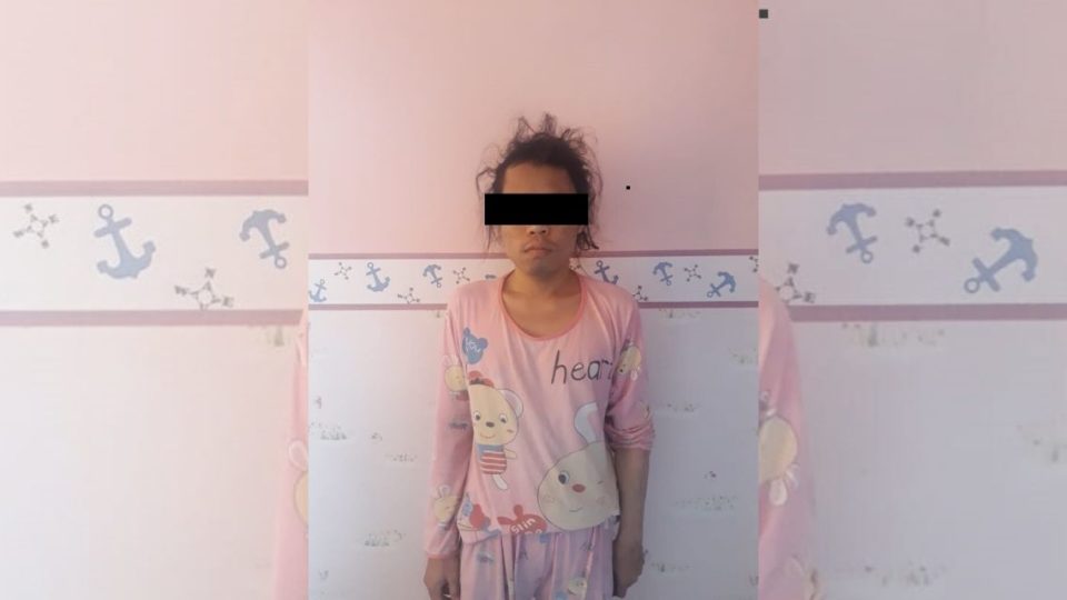 The man, identified by his initials RH, has reportedly been pretending to be a woman named Mawar in order to attract clients for his massage service. Photo: Indonesian National Police