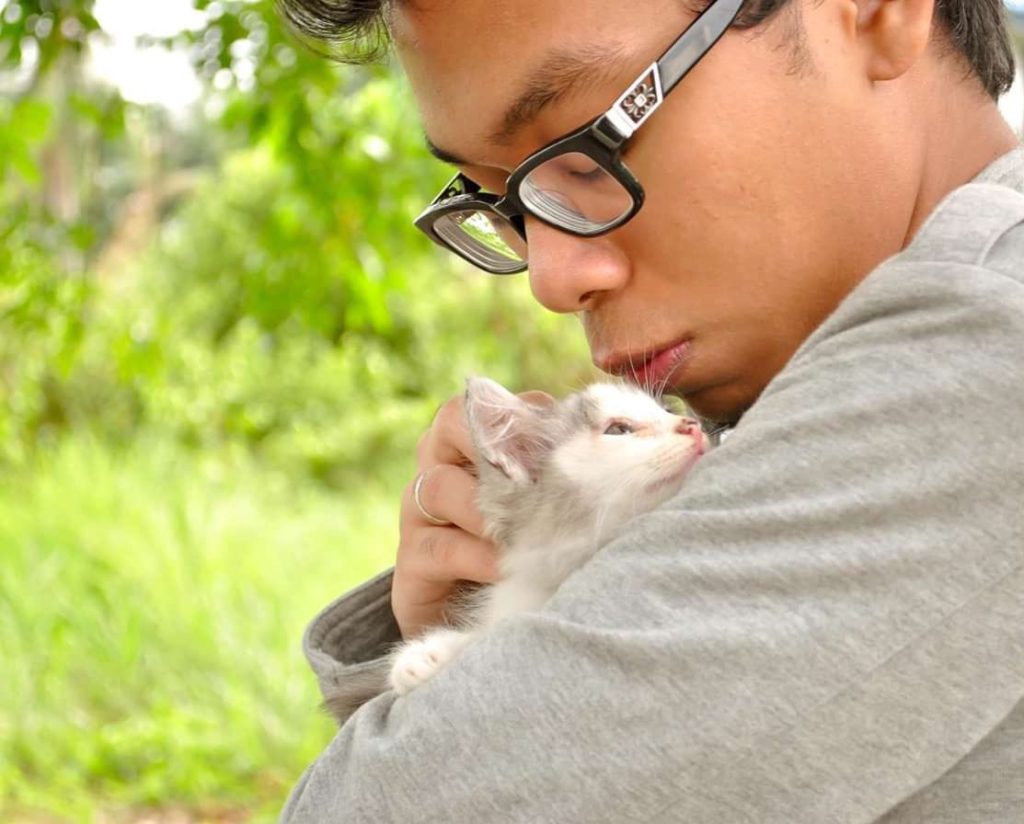 Photo of Terry and his beloved cat. Photo: Terry Rawther