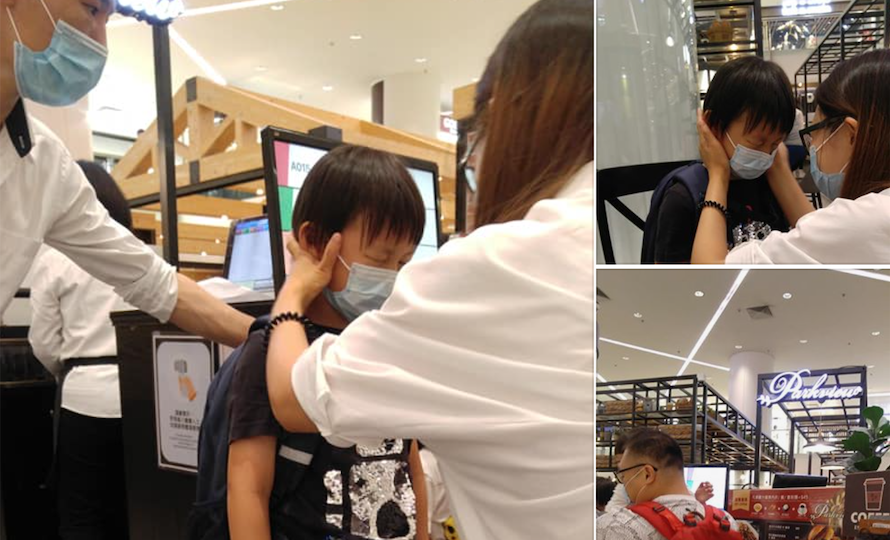 Boy is seen in pain after waiter at a reportedly sprays alcohol in his eye, thinking the bottle was a temperature gun, on June 14, 2020. Photo: Facebook/Cheng Man-chung