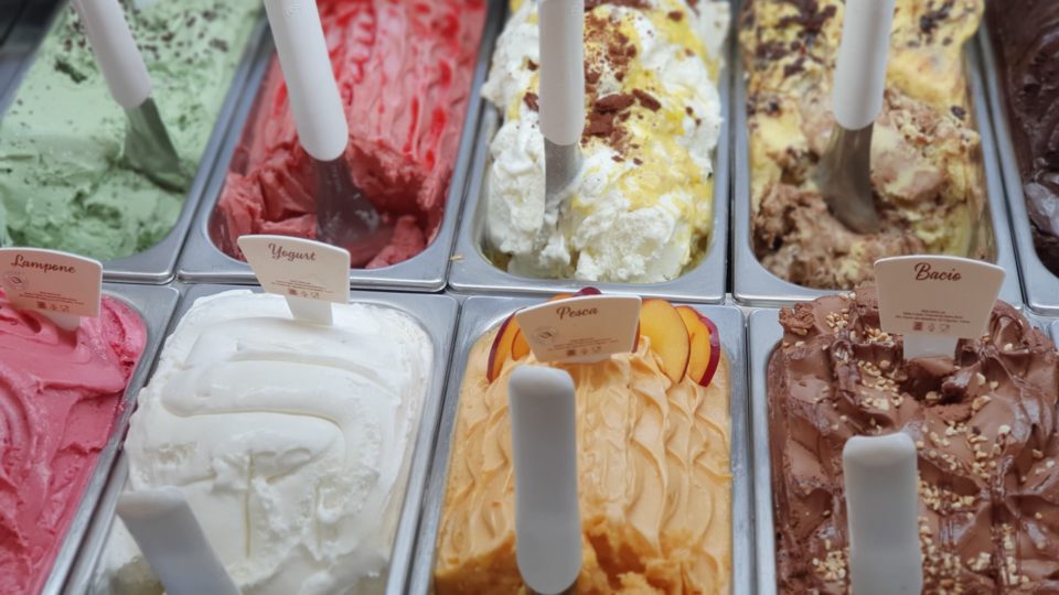 Ice cream on display at a dessert shop. Photo via Unsplash/@lamaroscu