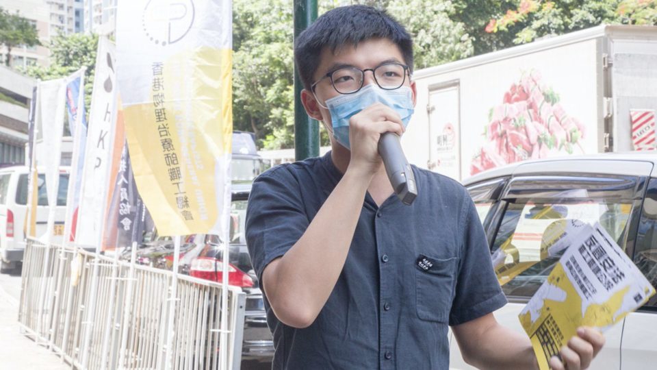 Hong Kong pro-democracy activist Joshua Wong hands out leaflets in Wong Tai Sin on June 20, 2012. Photo via Facebook/Joshua Wong