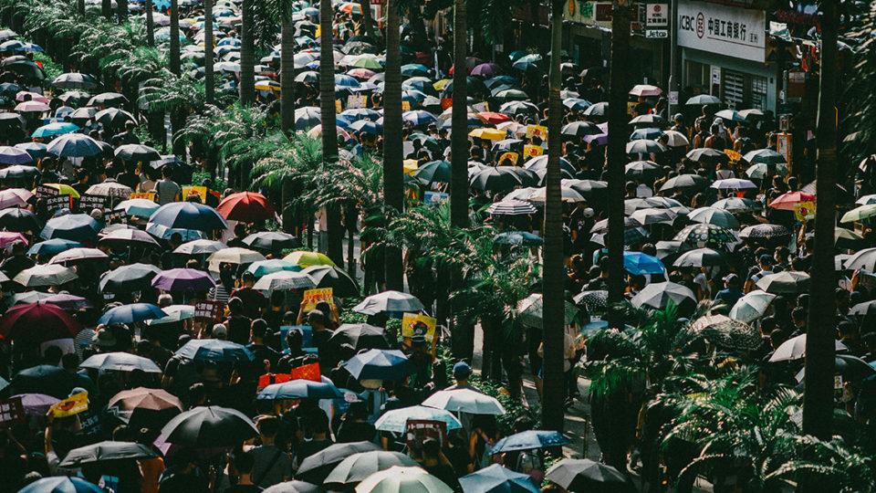 Protesters march against a controversial extradition bill in Hong Kong on May 24, 2019. Photo via Unsplash/Joseph Chan