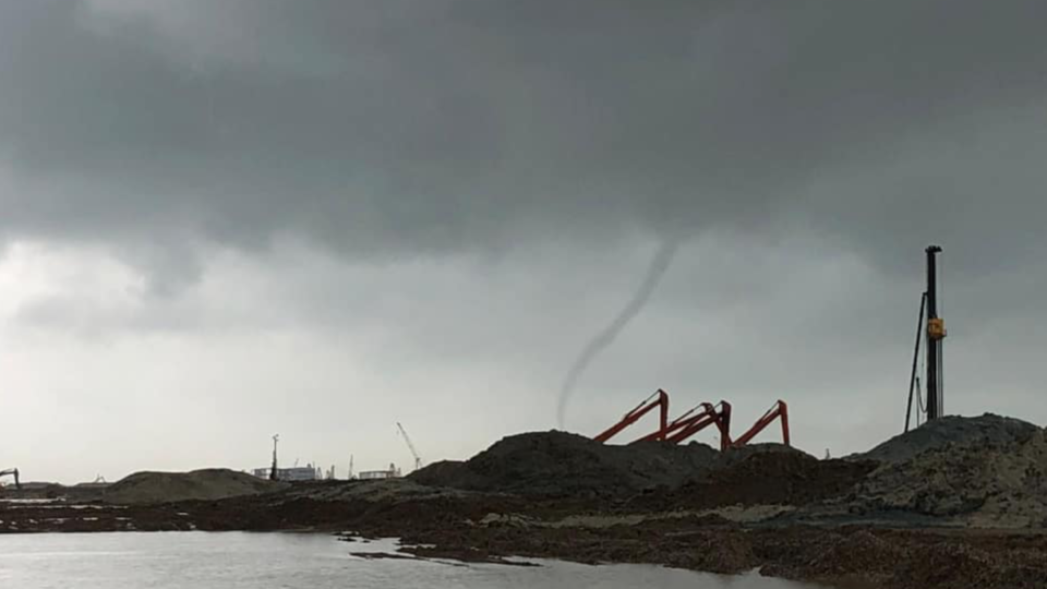 A waterspout is seen over Chek Lap Kok in western New Territories on June 8, 2020. Photo via Facebook/Samuel Tai