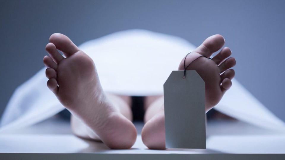 Photo illustration of a body in a morgue. Photo: Katarzyna Białasiewicz 
