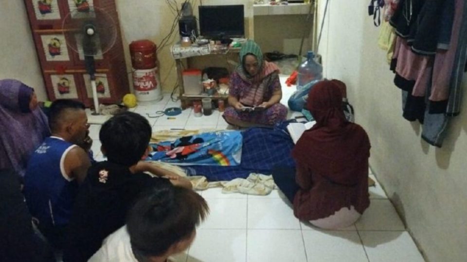 The body of YM, a 13-year-old boy who was tragically killed by a python, at his family home in Serpong, South Tangerang. Photo: Istimewa