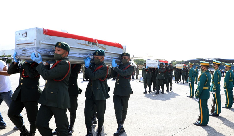 Three of the four slain Philippine Army soldiers arrive at the Villamor Military Airbase on June 30. <i>Photo: Philippine Army/ FB</i>
