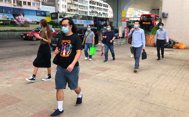 Hongkongers during their morning commute in Sheung Wan on July 23, 2020. Photo via Coconuts Media.